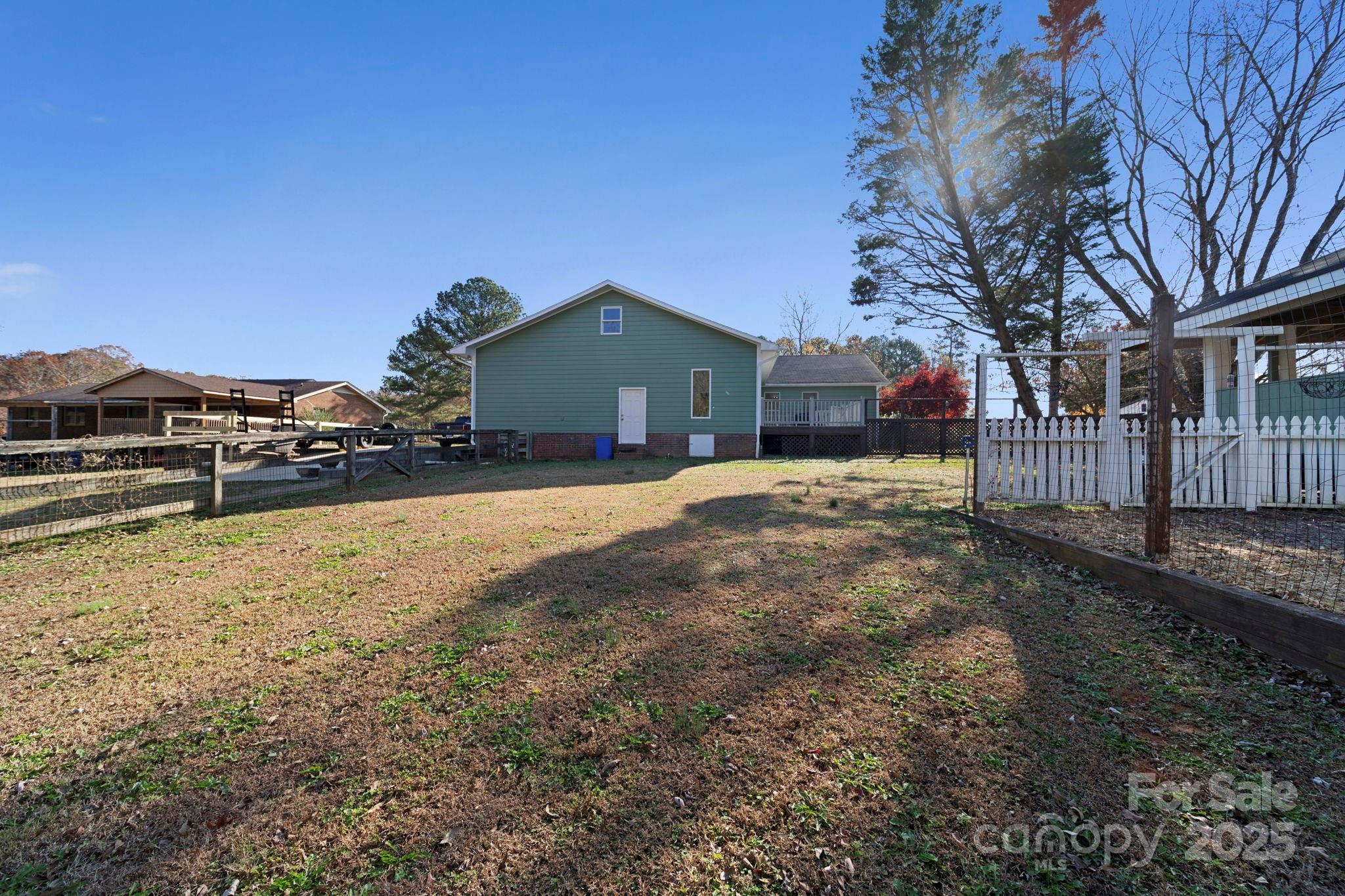 3400 Griffith Road Monroe, NC 28112 - Photo 7 of 46 a view of a house with a yard