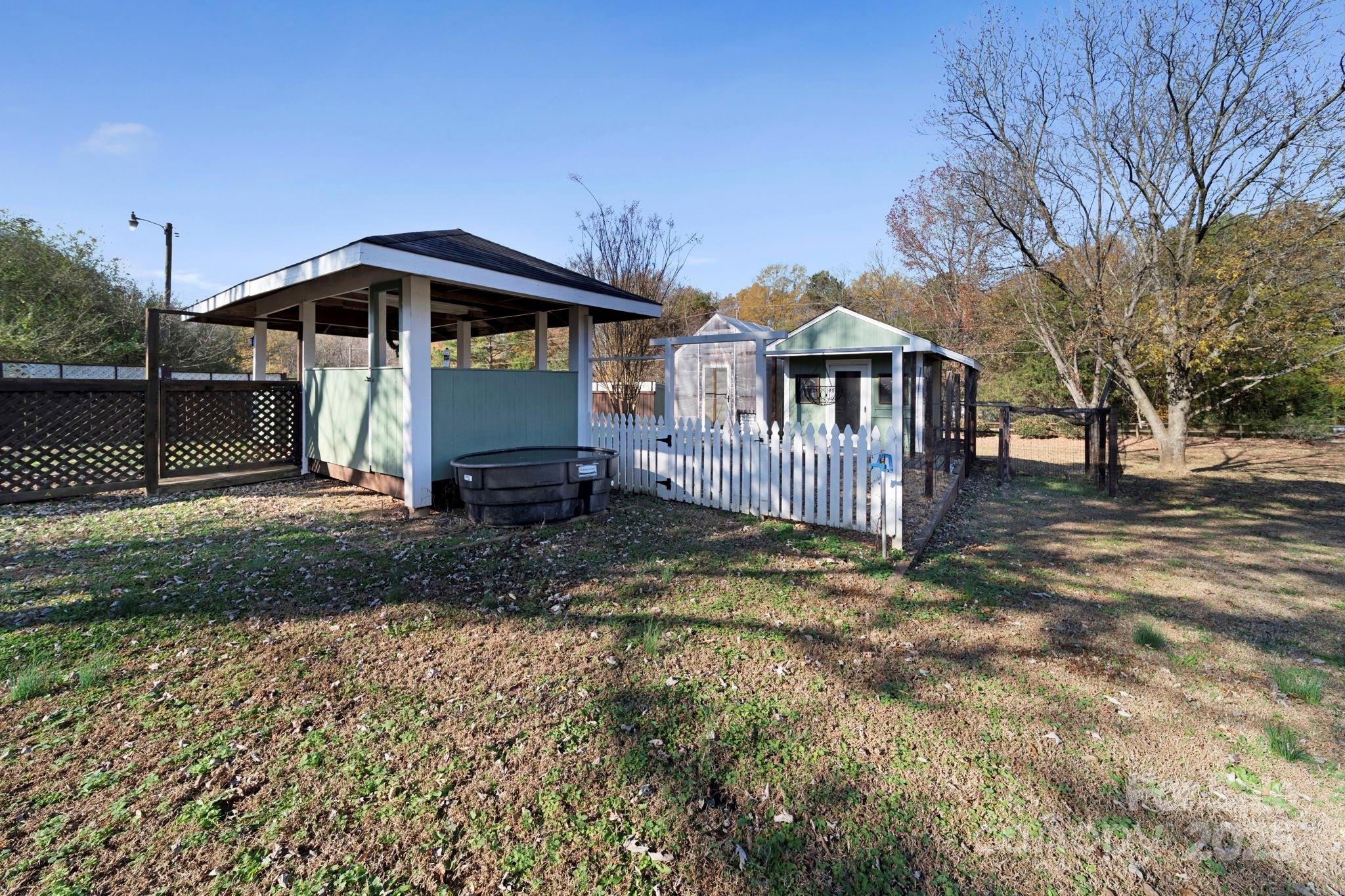 3400 Griffith Road Monroe, NC 28112 - Photo 8 of 46 a front view of a house with a yard