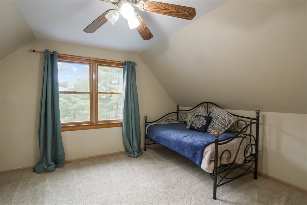 13 Taft Drive Franklin, MA 02038 - Photo 23 of 35 a living room with furniture and a window
