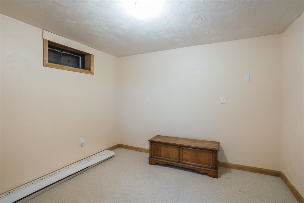 13 Taft Drive Franklin, MA 02038 - Photo 29 of 35 a room with a table