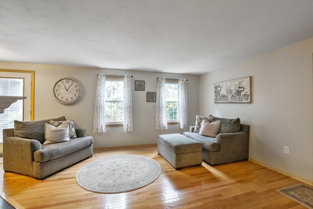 13 Taft Drive Franklin, MA 02038 - Photo 6 of 35 a living room with furniture and a window