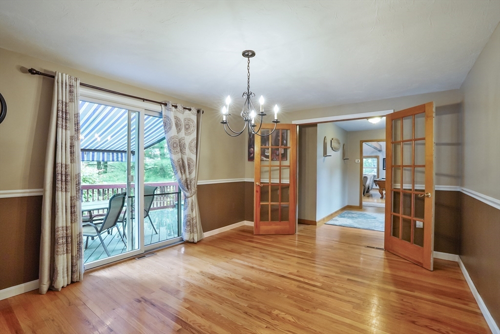 13 Taft Drive Franklin, MA 02038 - Photo 9 of 35 a view of a livingroom with wooden floor
