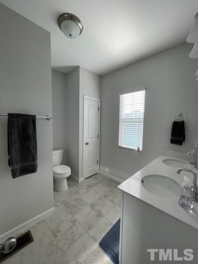 6051 Beale Loop Raleigh, NC 27616 - Photo 19 of 30 Ceramic tile floors & quartz counter tops