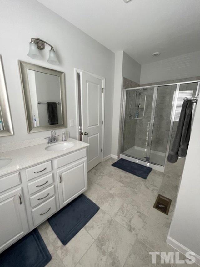 6051 Beale Loop Raleigh, NC 27616 - Photo 20 of 30 walk-in tiled shower