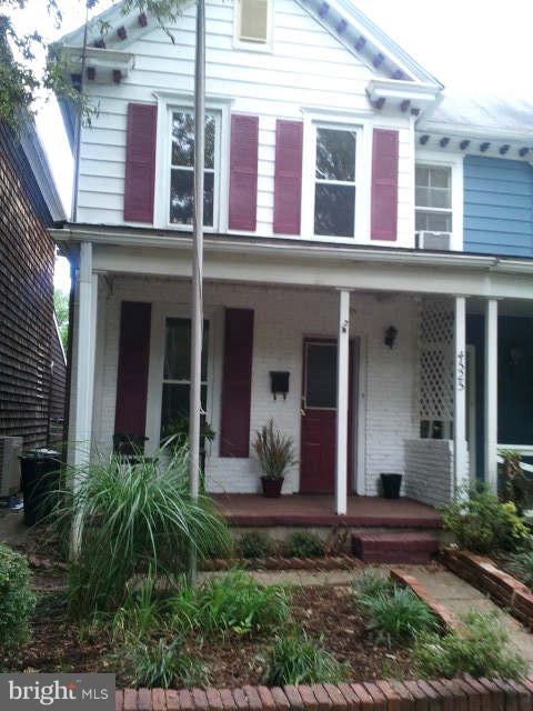 4525 Wilmslow Road Baltimore, MD 21210 - Photo 1 of 14 front view of a brick house with a yard