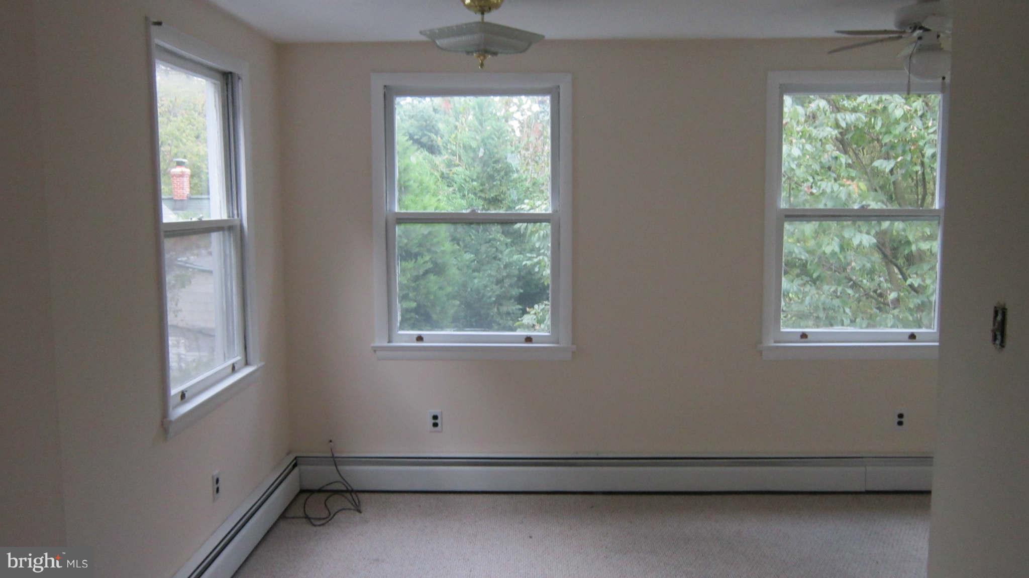 4525 Wilmslow Road Baltimore, MD 21210 - Photo 8 of 14 an empty room with a window