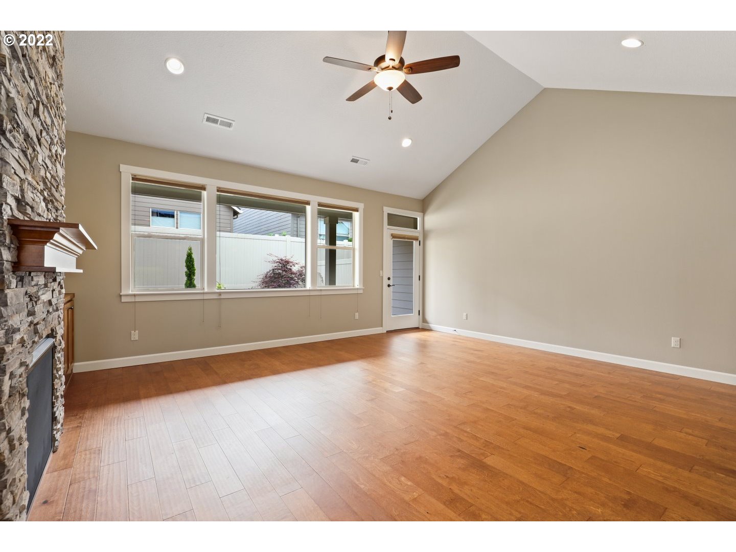 1719 Northeast 175th Street Ridgefield, WA 98642 - Photo 11 of 32 a view of empty room with wooden floor and fan