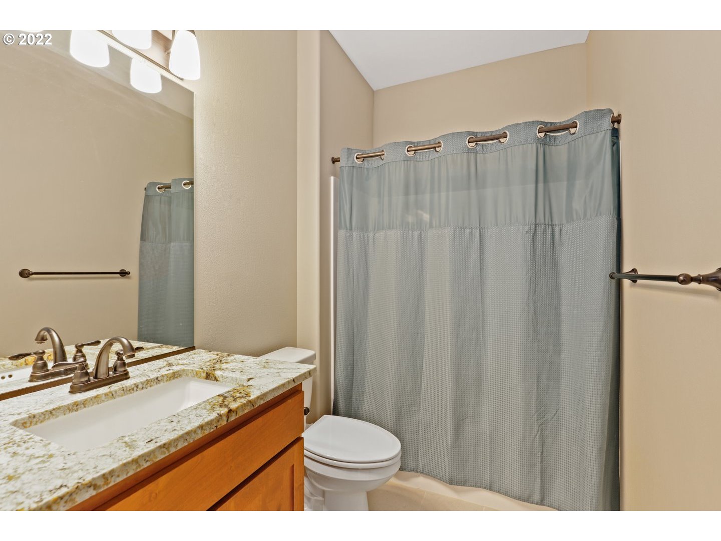 1719 Northeast 175th Street Ridgefield, WA 98642 - Photo 26 of 32 a bathroom with a granite countertop sink toilet and shower