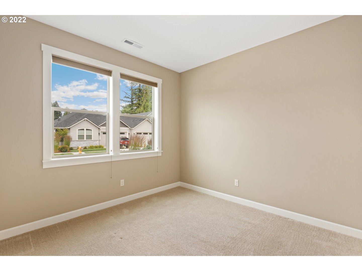 1719 Northeast 175th Street Ridgefield, WA 98642 - Photo 5 of 32 a view of an empty room with a window