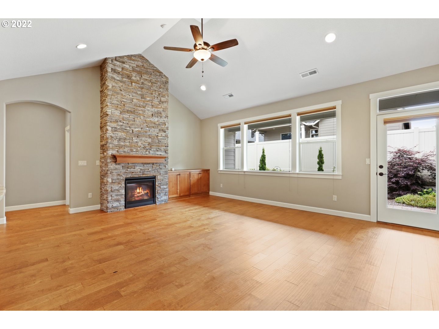 1719 Northeast 175th Street Ridgefield, WA 98642 - Photo 10 of 32 a view of an empty room with a fireplace and a window