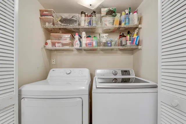 a utility room with dryer and washer