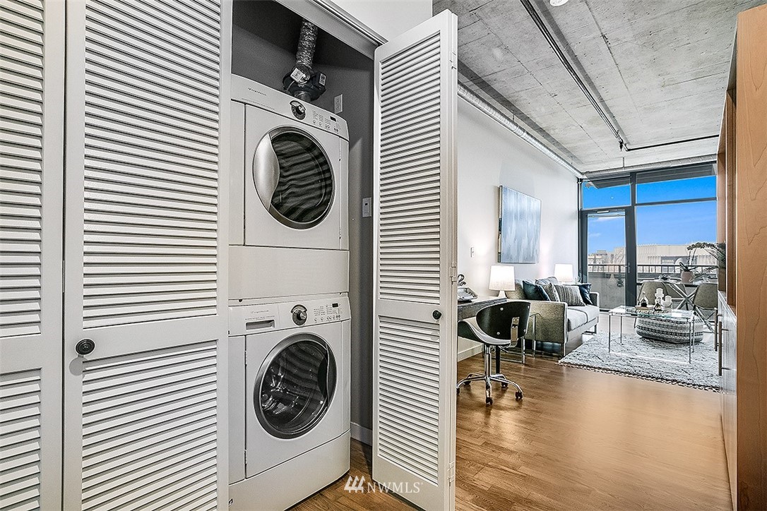 2720 3rd Avenue, Unit 502 Seattle, WA 98121 - Photo 12 of 28 a view of living room with furniture and floor to ceiling window