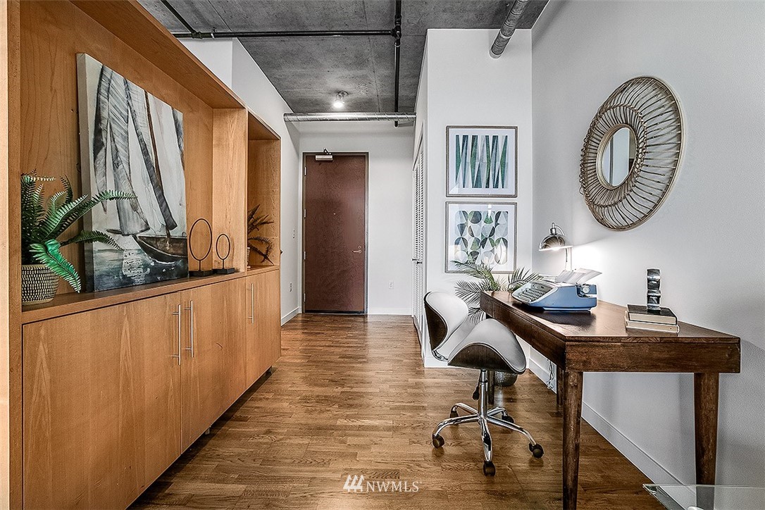 2720 3rd Avenue, Unit 502 Seattle, WA 98121 - Photo 6 of 28 a view of a room with furniture and windows