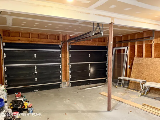 a view of room with gym equipment