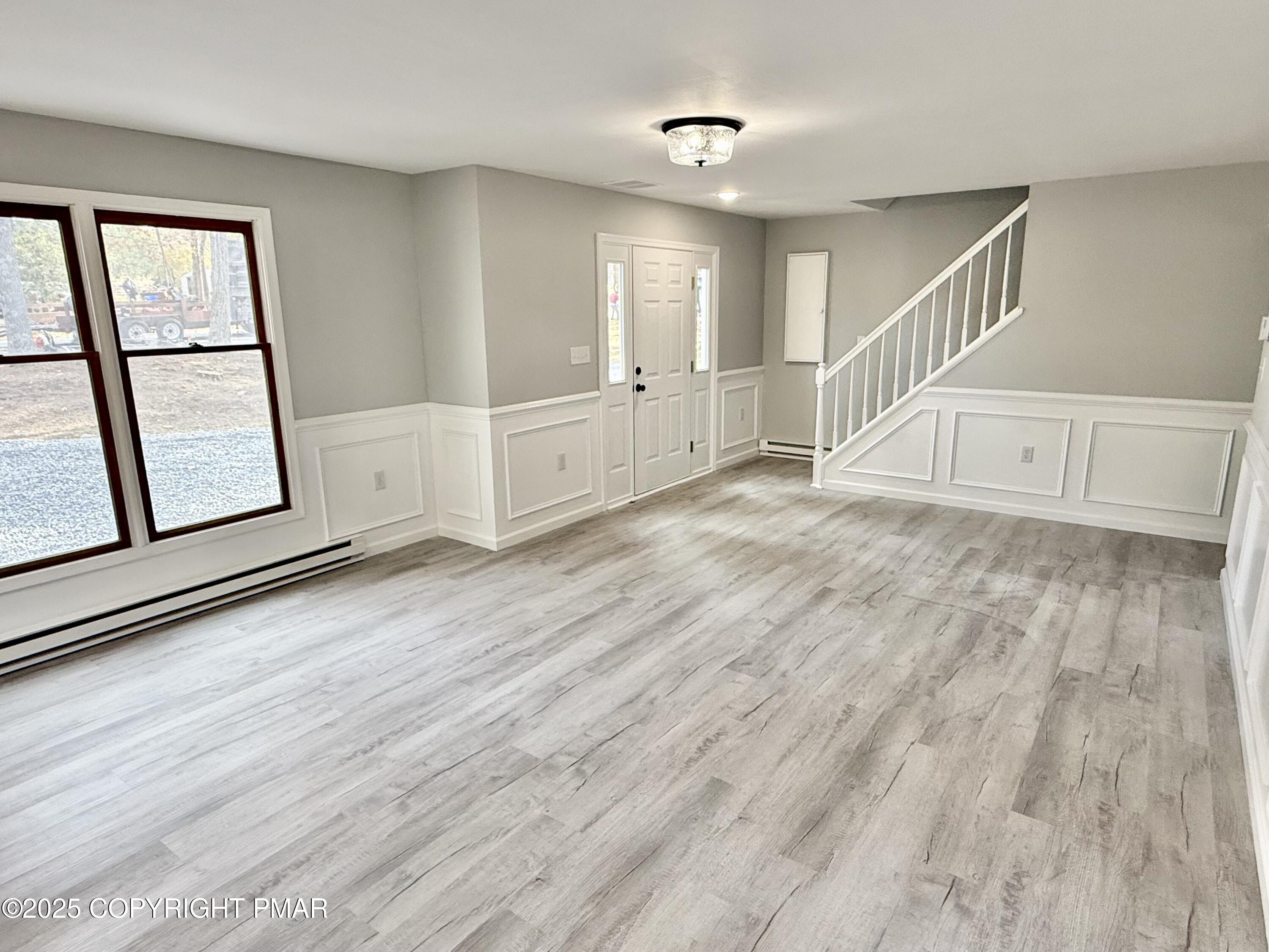 104 Dunchurch Drive Bushkill, PA 18324 - Photo 4 of 35 a view of entryway with wooden floor