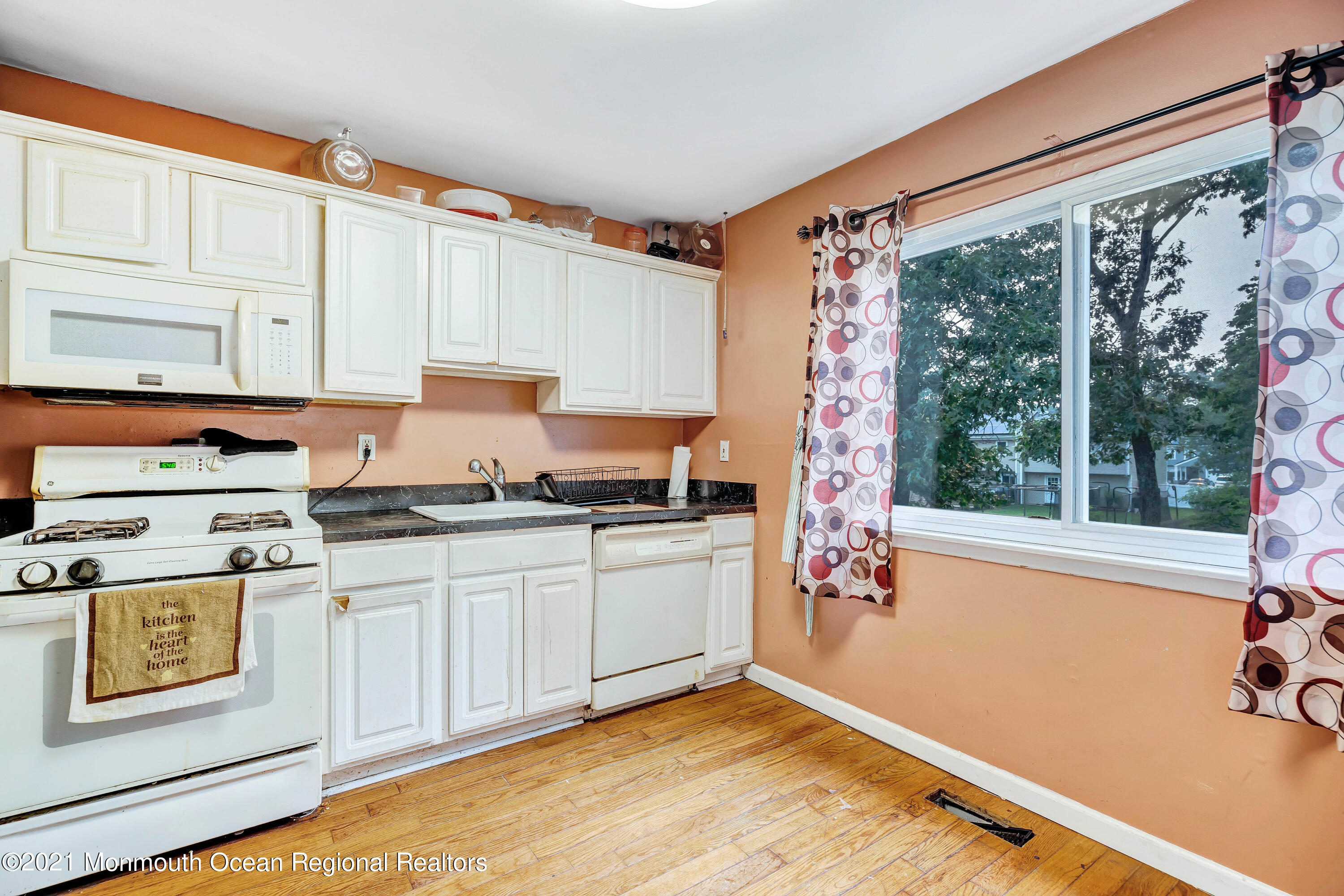 458 Brewers Bridge Road Jackson, NJ 08527 - Photo 13 of 27 a kitchen with stainless steel appliances granite countertop a stove a sink and a microwave