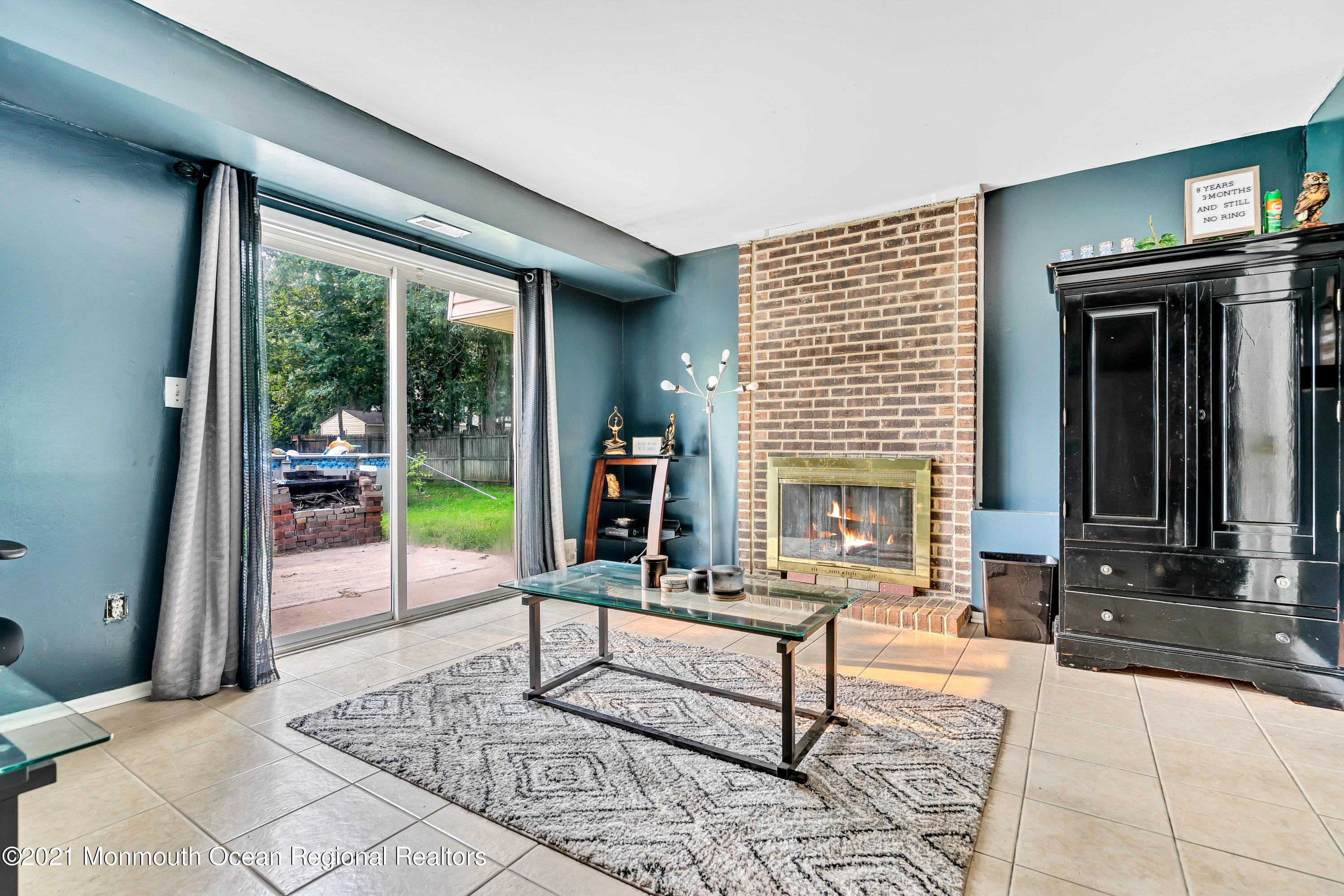 458 Brewers Bridge Road Jackson, NJ 08527 - Photo 21 of 27 a living room with furniture and a fireplace
