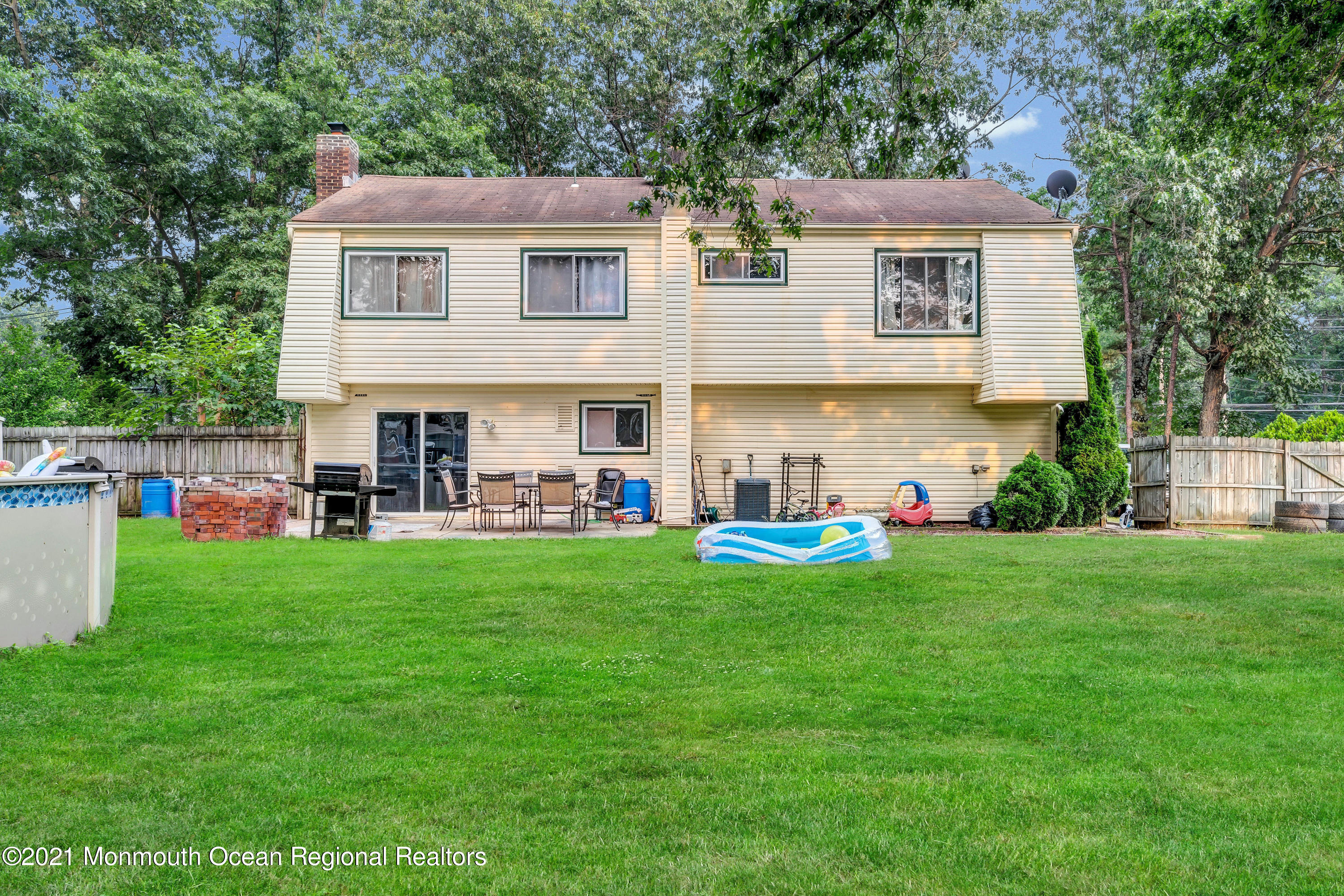 458 Brewers Bridge Road Jackson, NJ 08527 - Photo 27 of 27 a front view of house with yard and green space