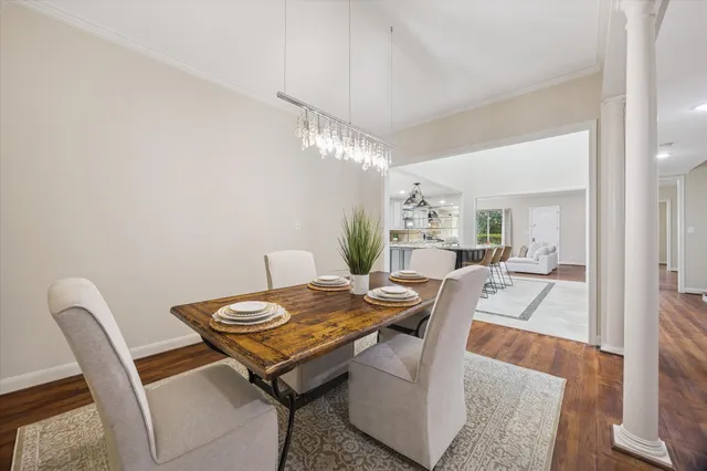 a kitchen with stainless steel appliances granite countertop a sink and stove