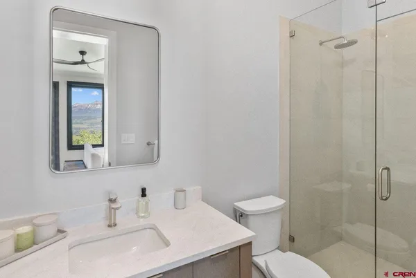 a backyard of a house with yard fire pit and outdoor seating