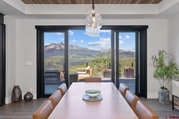 a spacious bathroom with a double vanity sink mirror and bathtub