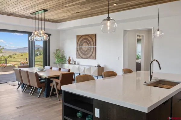 a bed room with a bed and a large window