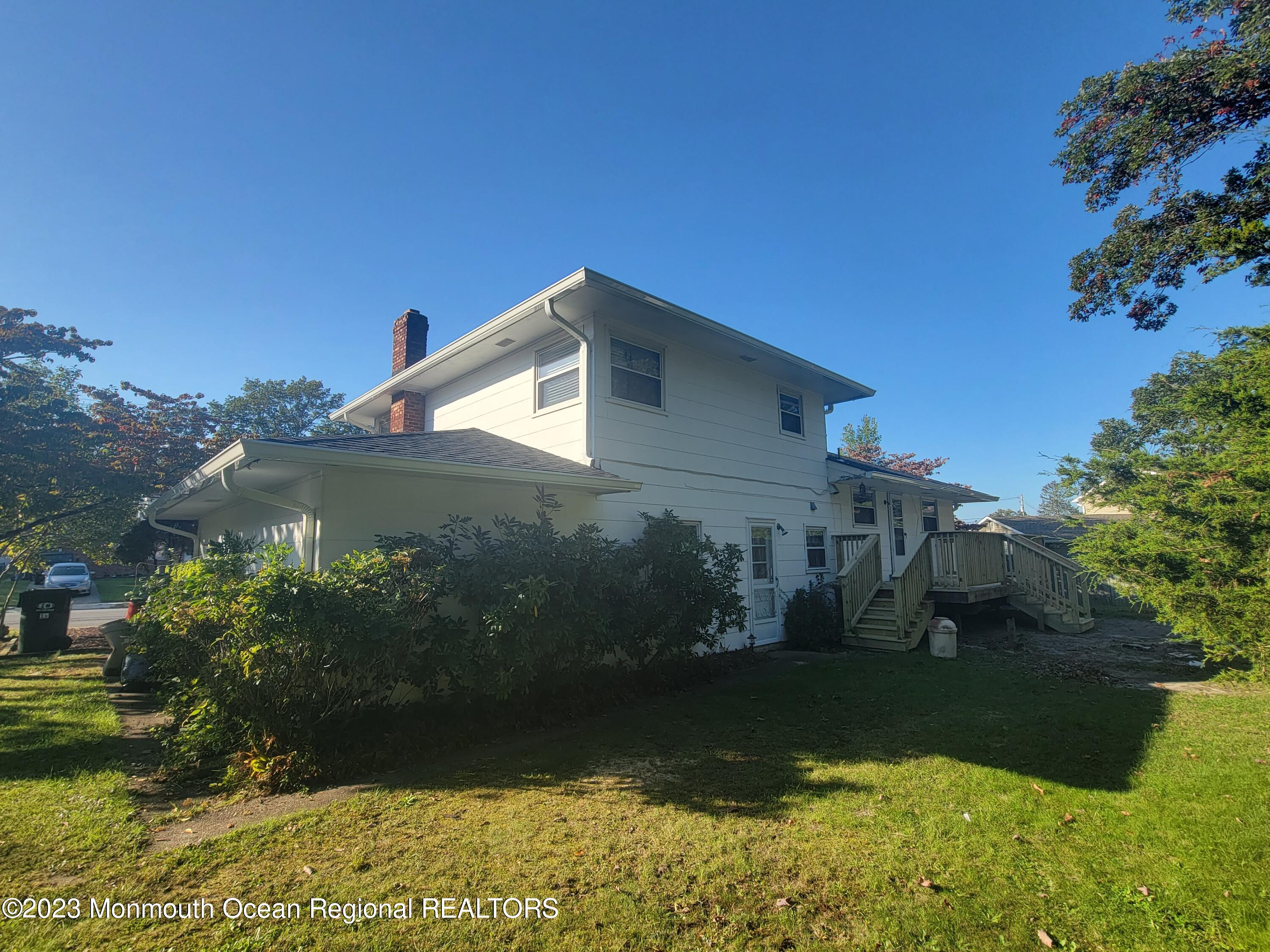 96 Newbury Road Howell, NJ 07731 - Photo 12 of 12 a house view with a garden space