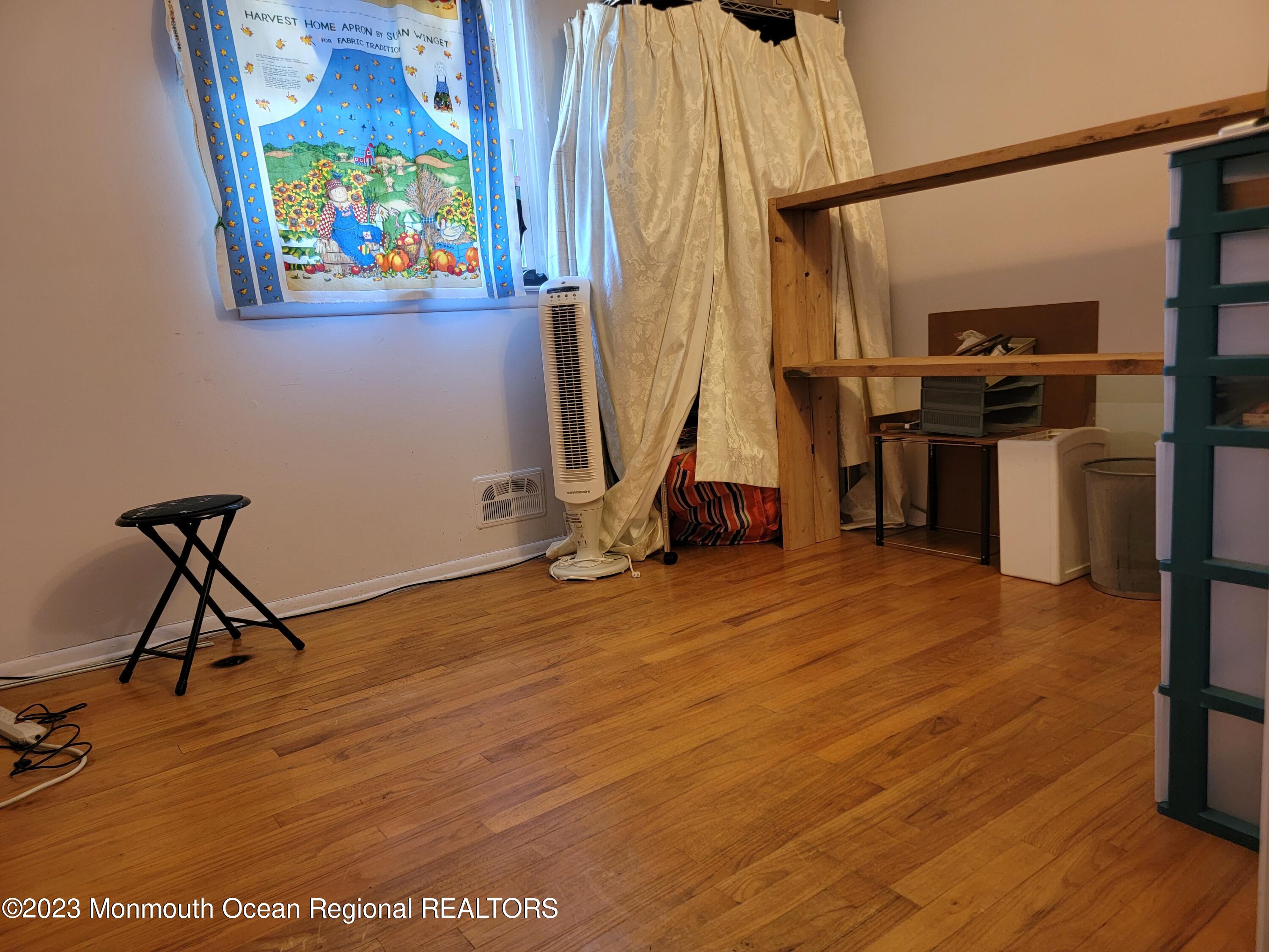 96 Newbury Road Howell, NJ 07731 - Photo 8 of 12 a view of a room with gym equipment