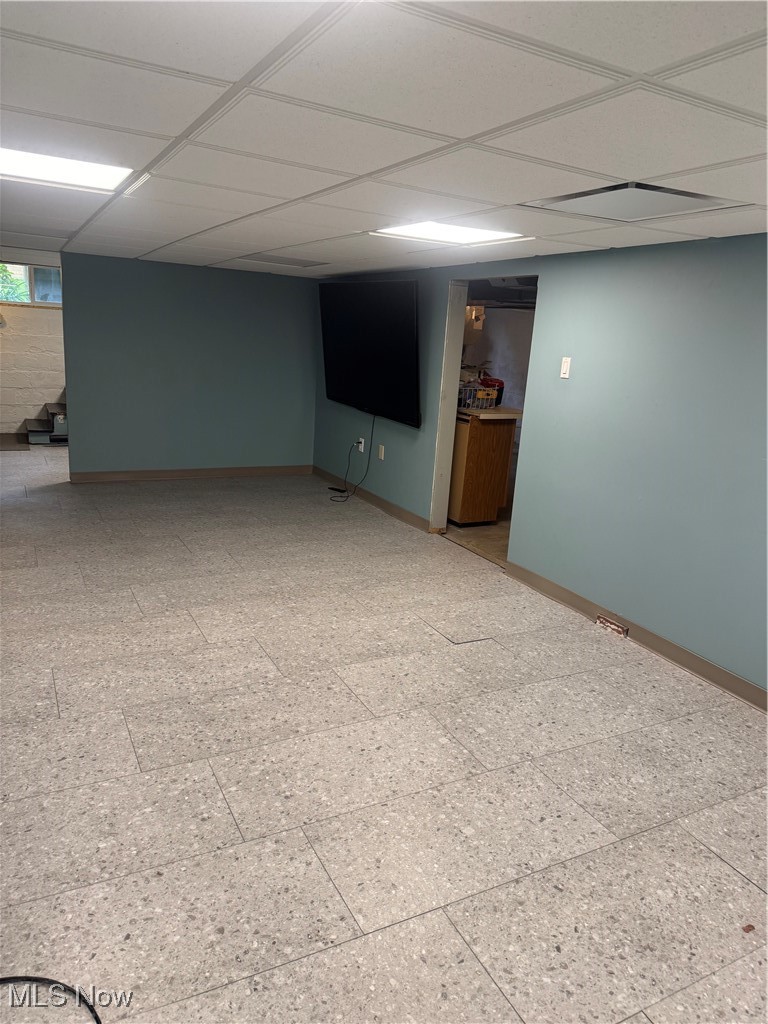 3261 Darrow Road Stow, OH 44224 - Photo 22 of 27 Finished basement with baseboards and a paneled ceiling