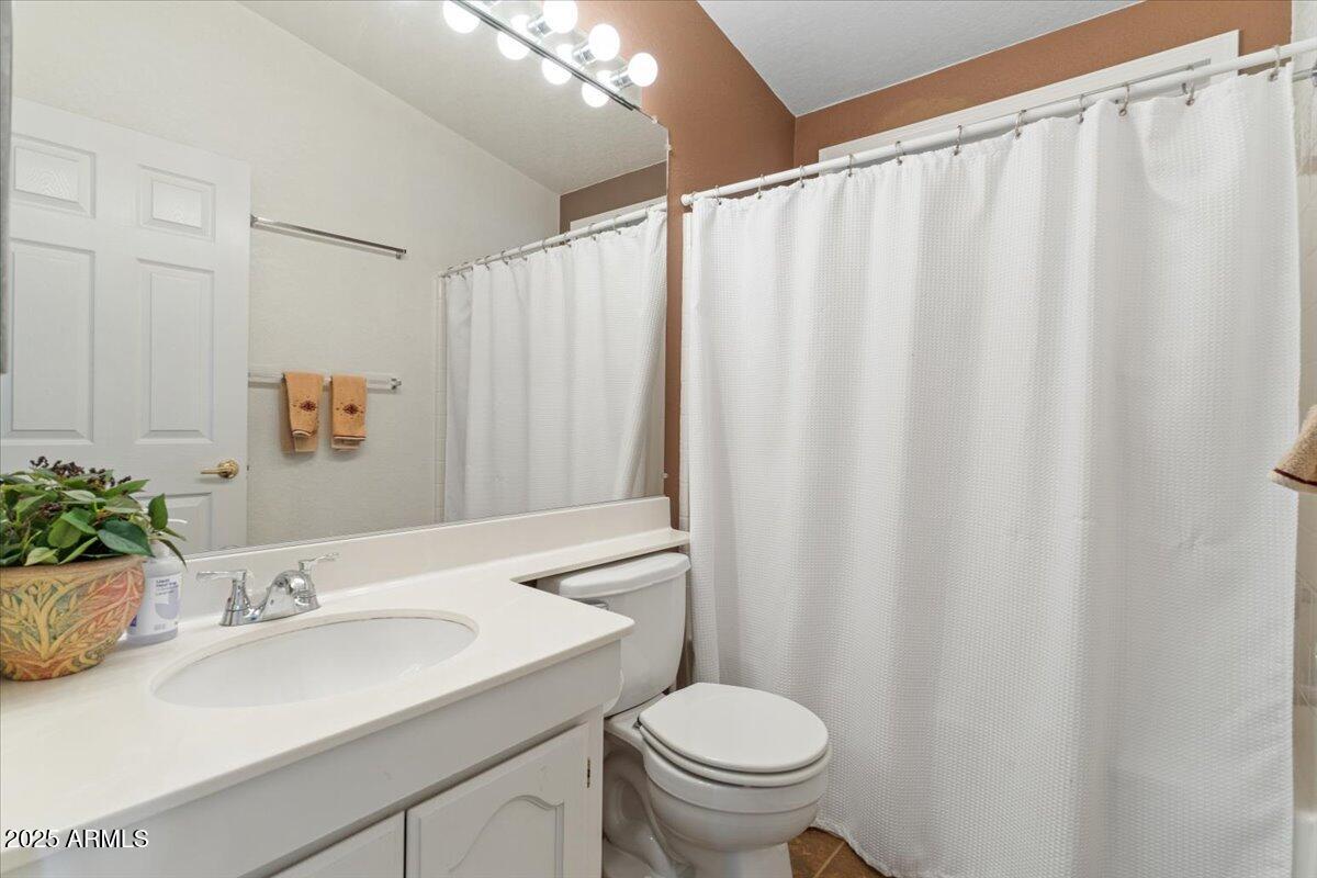 2054 North Thornton Road, Unit 125 Casa Grande, AZ 85122 - Photo 17 of 26 a bathroom with a sink and a mirror