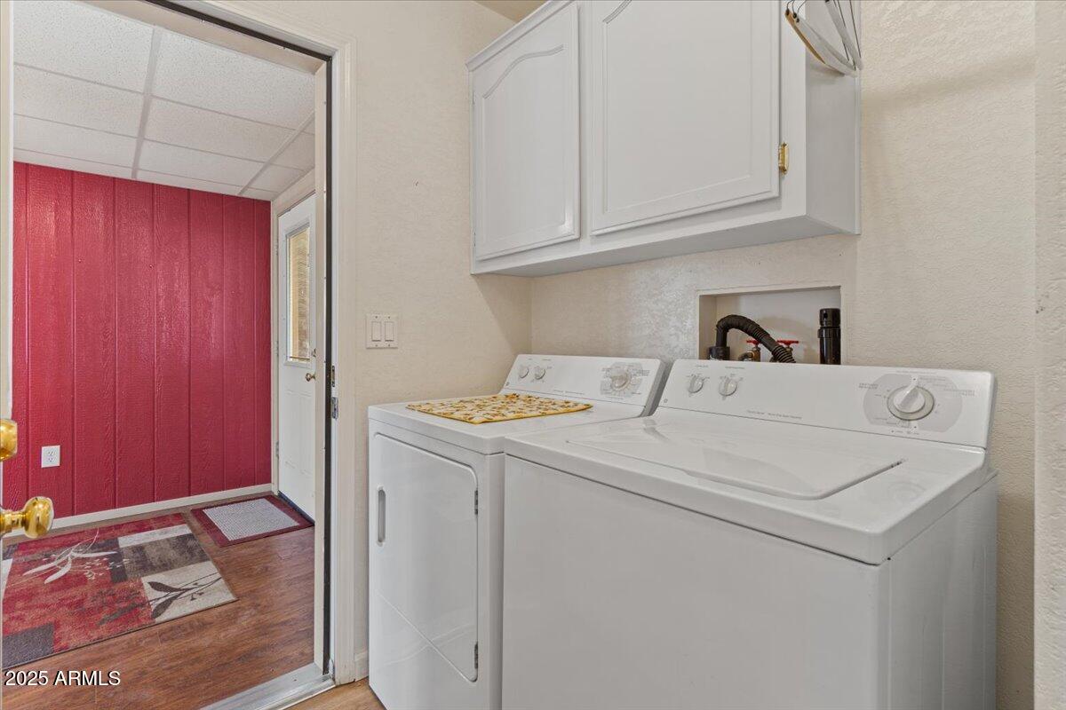 2054 North Thornton Road, Unit 125 Casa Grande, AZ 85122 - Photo 18 of 26 a utility room with dryer and washer