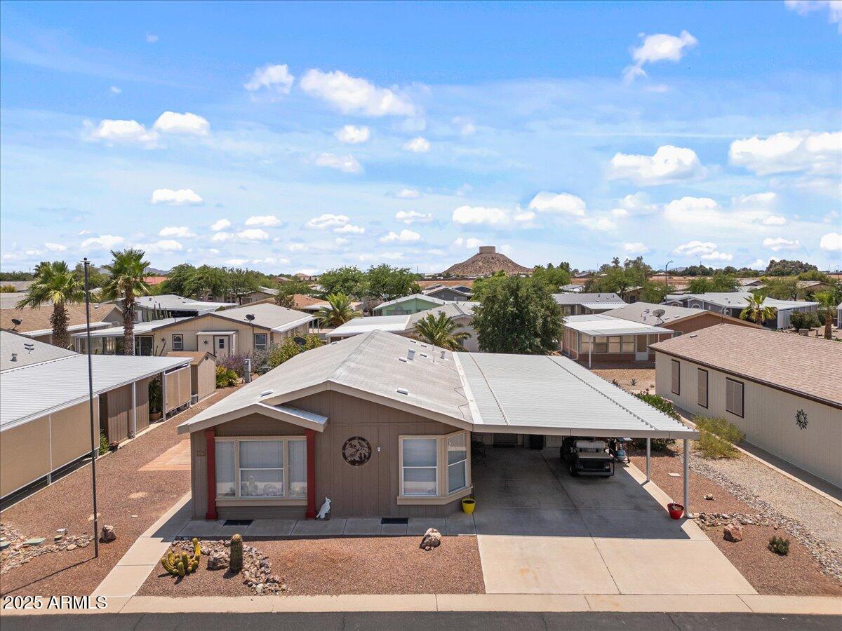 2054 North Thornton Road, Unit 125 Casa Grande, AZ 85122 - Photo 24 of 26 a view of a house with a terrace
