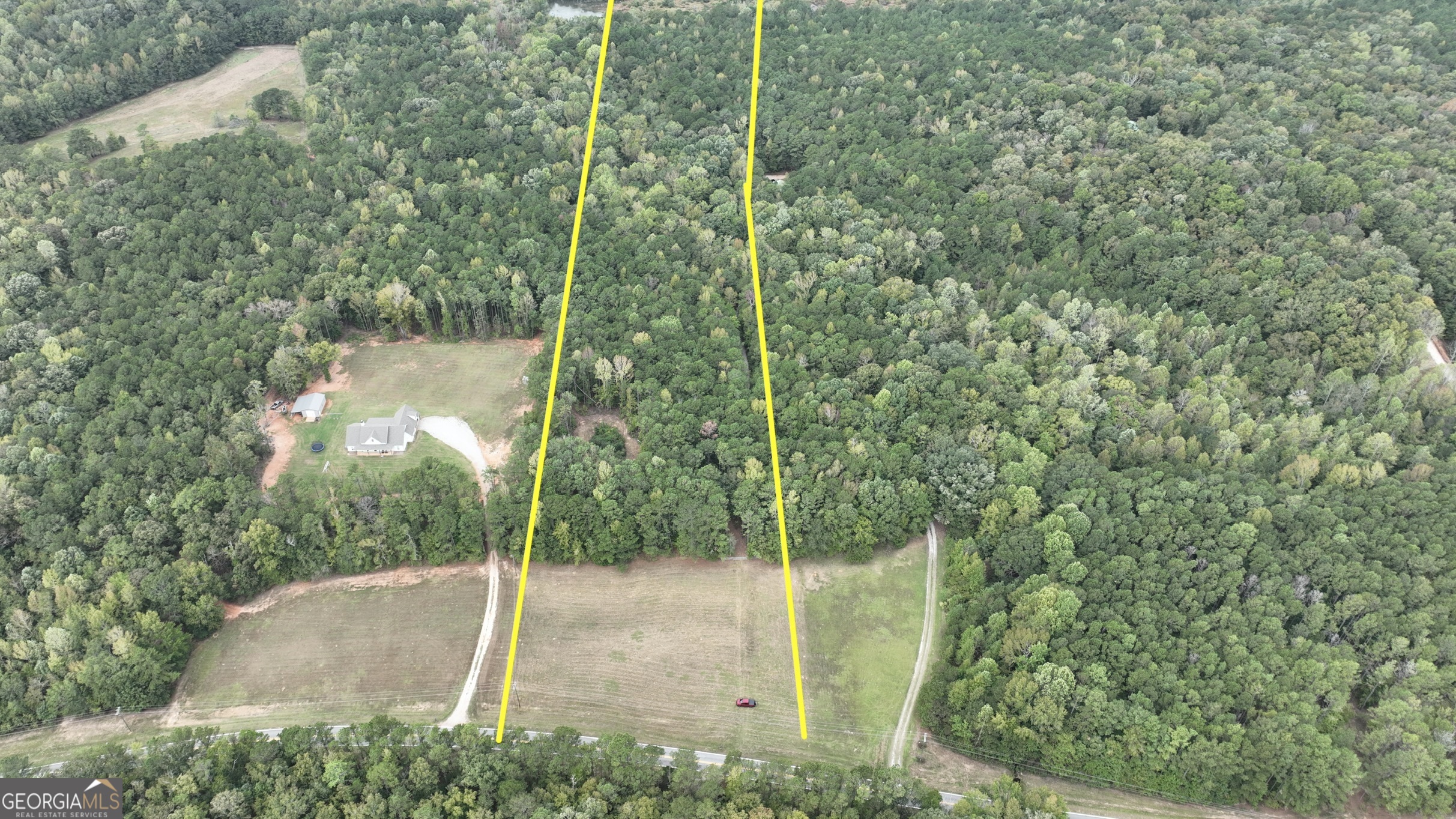 3840 Kings Road Meansville, GA 30256 - Photo 2 of 13 a view of a forest with a trees