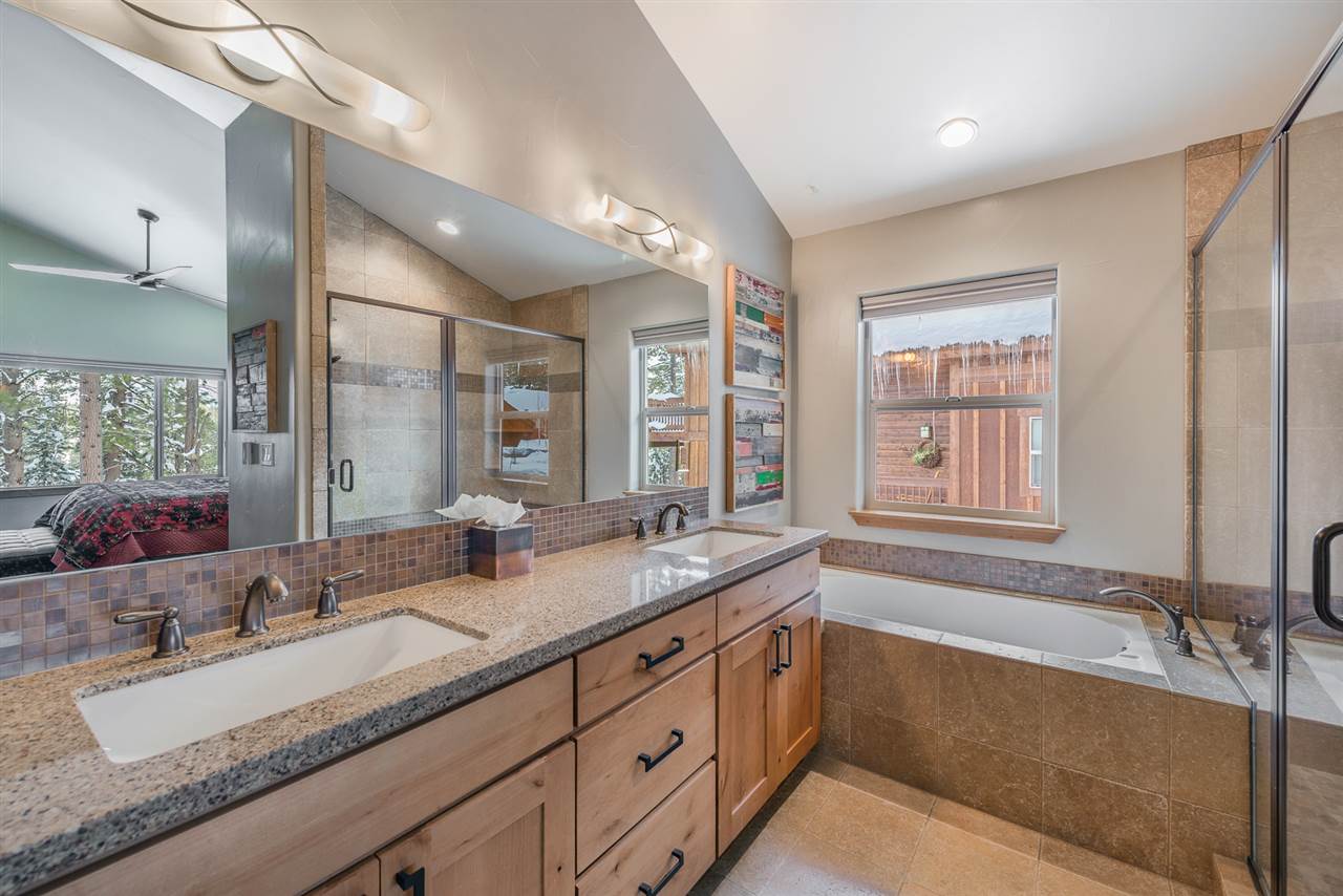 10427 Winter Creek Loop Truckee, CA 96161 - Photo 13 of 21 a bathroom with double vanity sinks tub double vanity and mirror