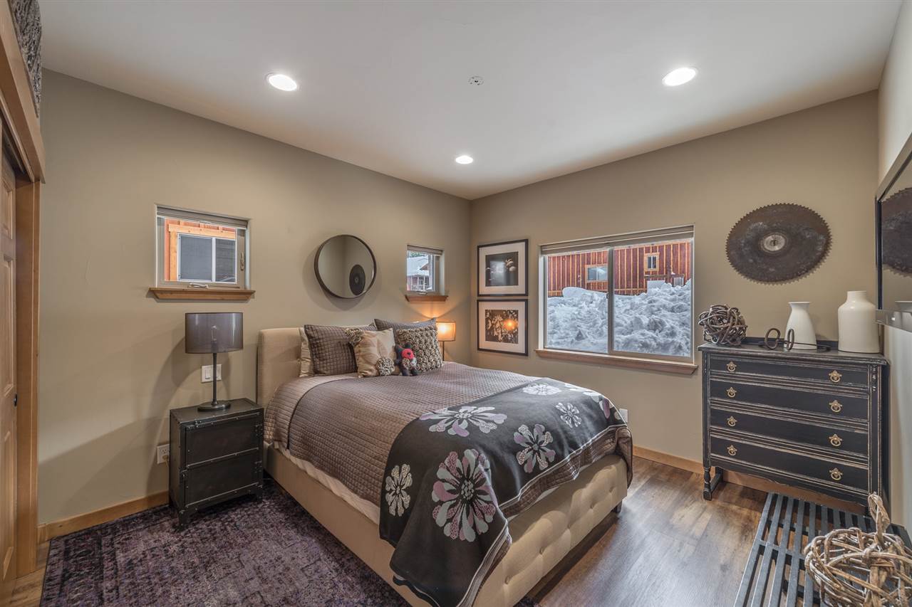 10427 Winter Creek Loop Truckee, CA 96161 - Photo 17 of 21 a bedroom with a bed and a dresser