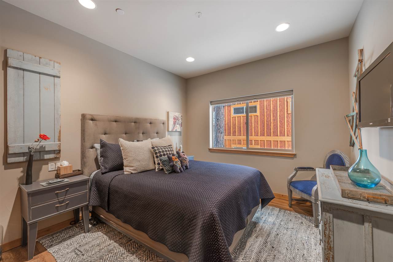 10427 Winter Creek Loop Truckee, CA 96161 - Photo 19 of 21 a bedroom with a bed and a window