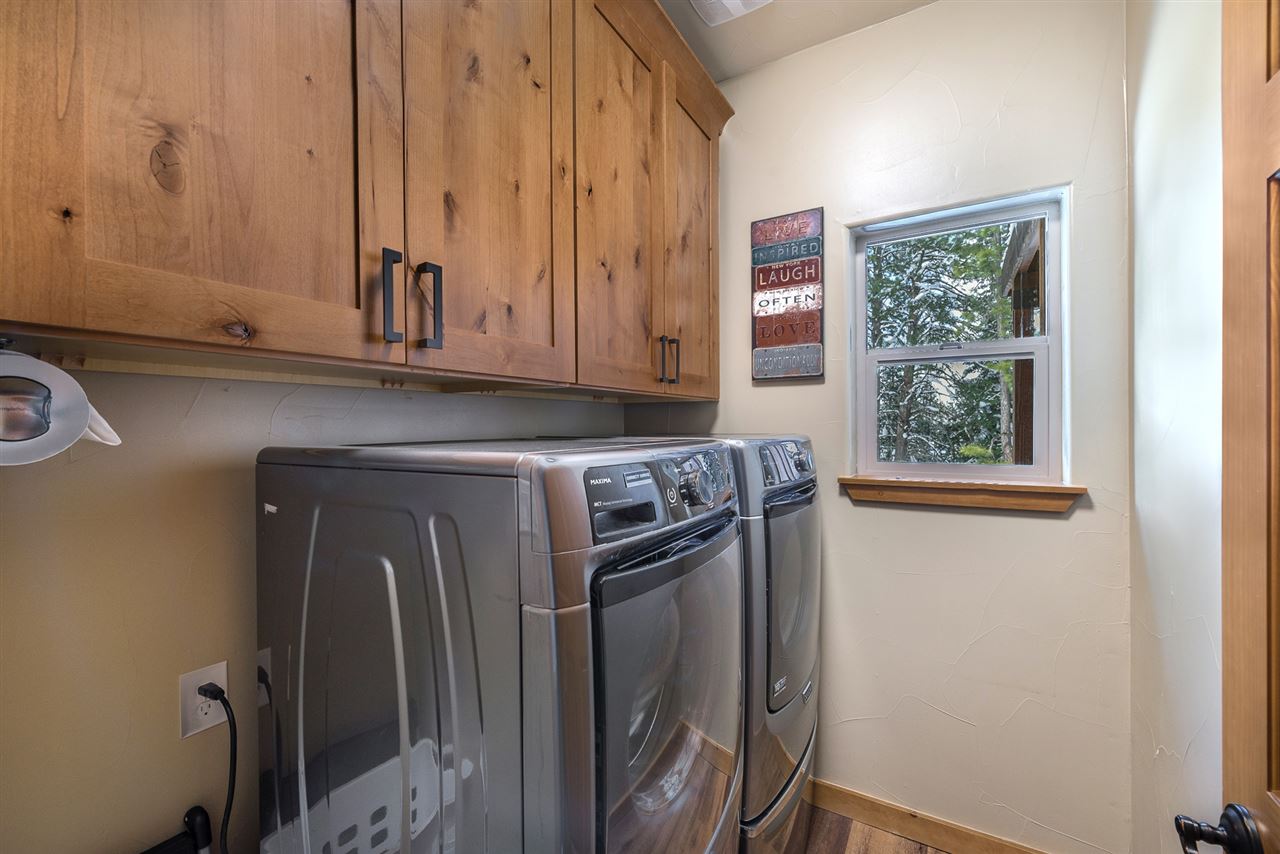 10427 Winter Creek Loop Truckee, CA 96161 - Photo 20 of 21 a kitchen with a refrigerator and window