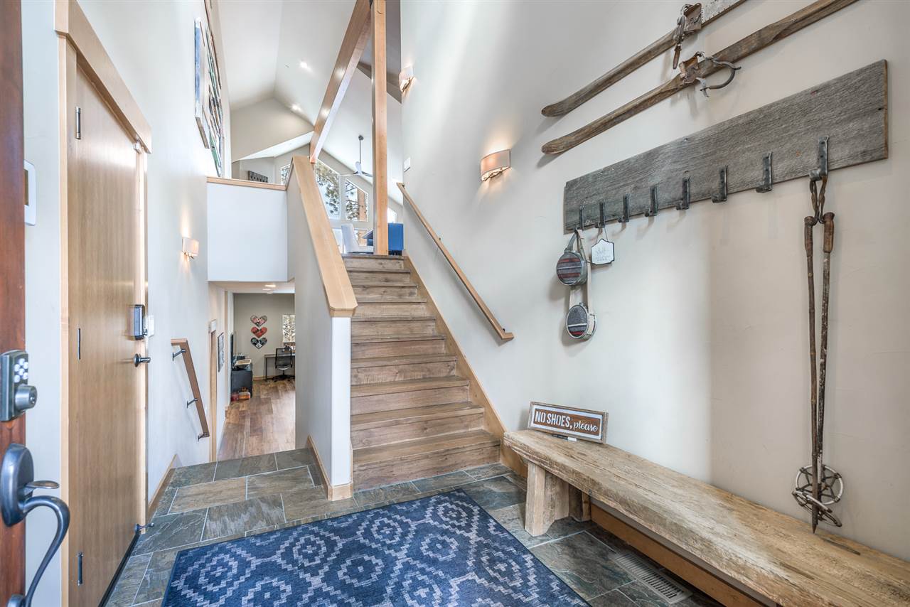 10427 Winter Creek Loop Truckee, CA 96161 - Photo 2 of 21 a view of a hallway with staircase