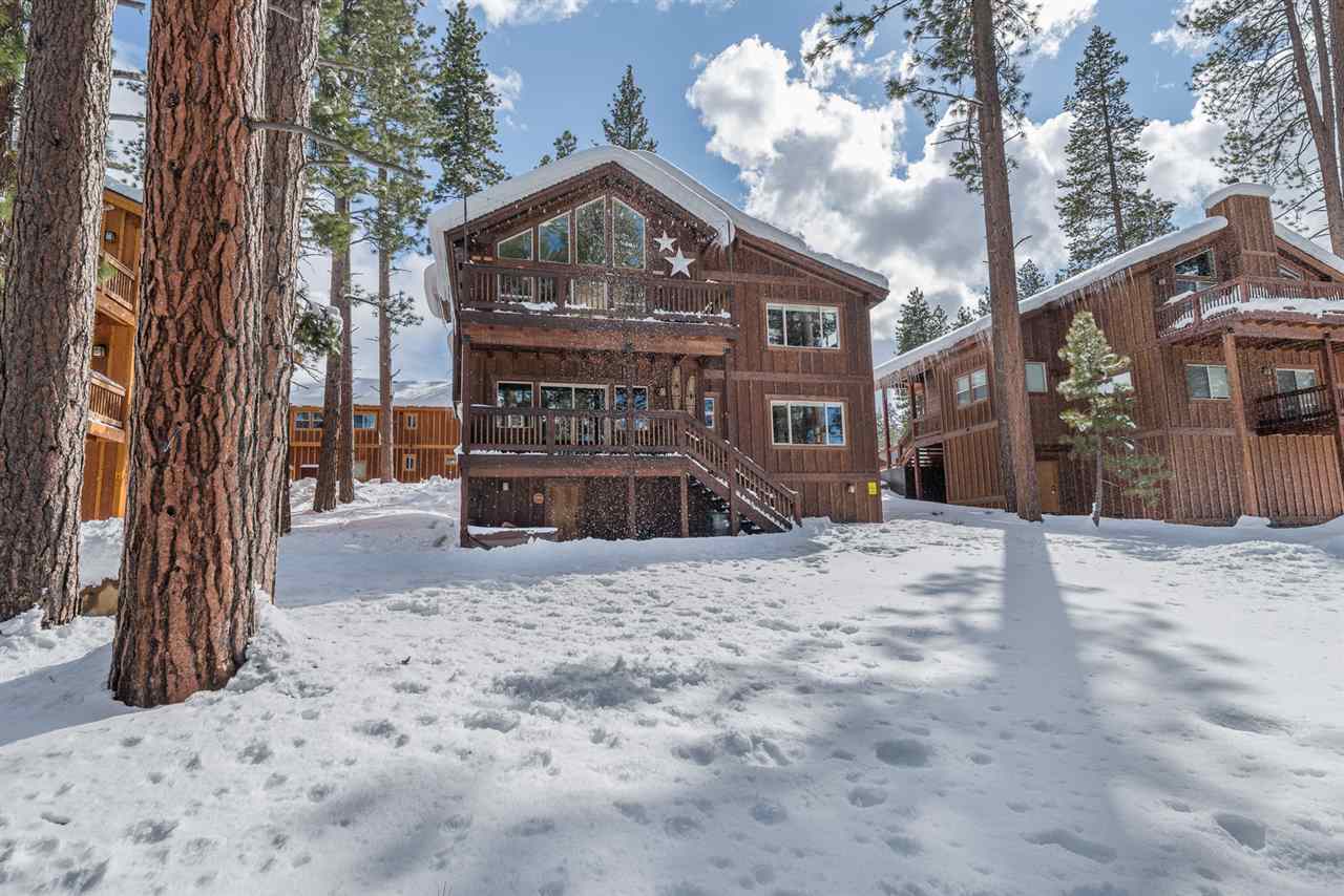 10427 Winter Creek Loop Truckee, CA 96161 - Photo 21 of 21 a front view of a house with a yard covered with snow