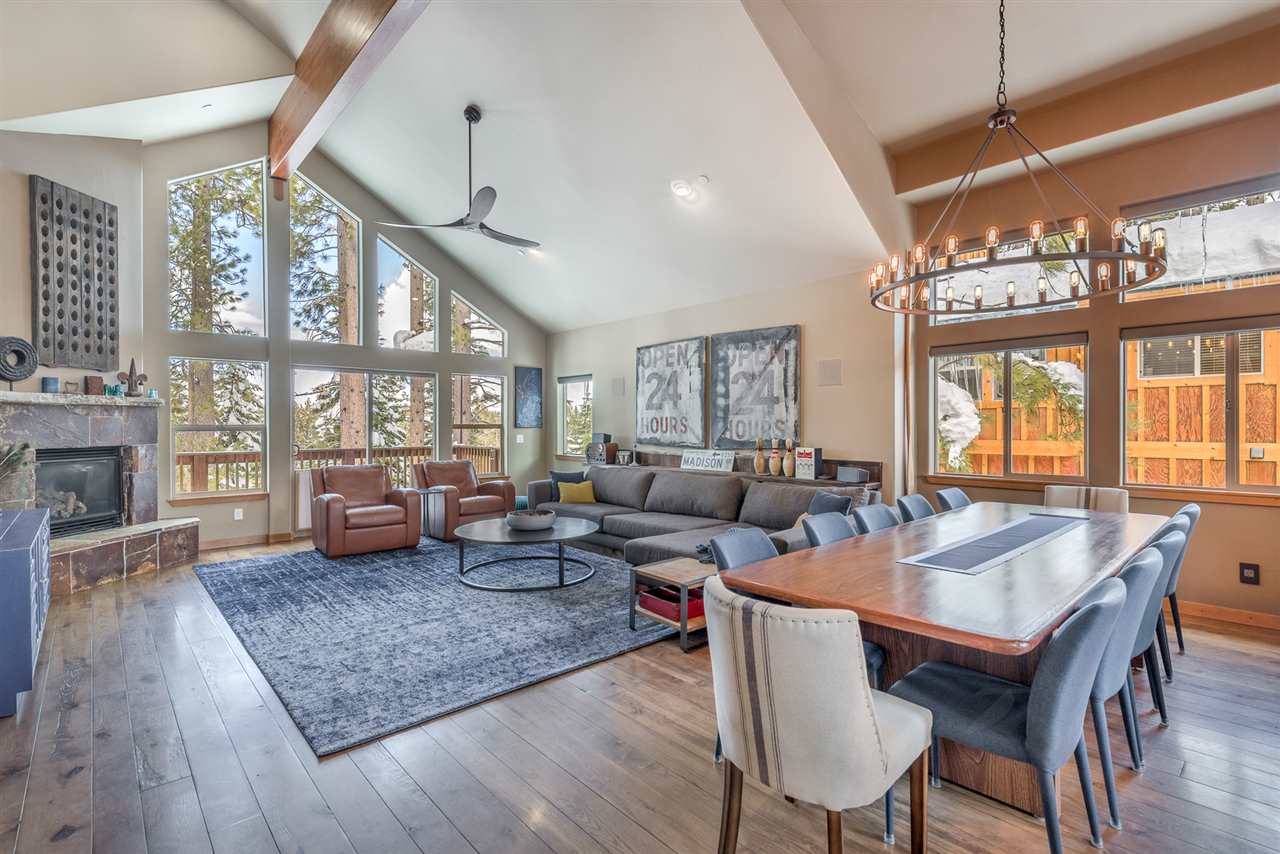 10427 Winter Creek Loop Truckee, CA 96161 - Photo 3 of 21 a living room with fireplace furniture and a large window