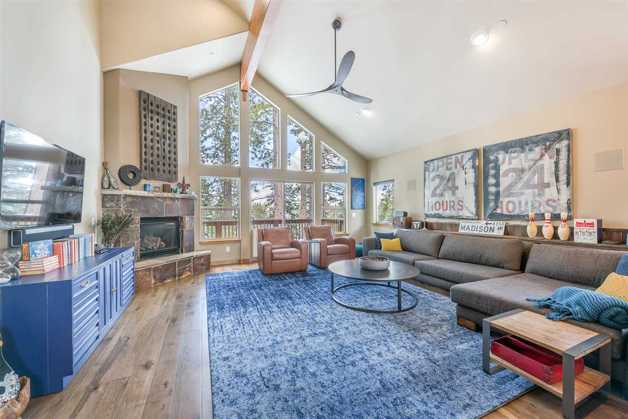 10427 Winter Creek Loop Truckee, CA 96161 - Photo 4 of 21 a living room with furniture fireplace and flat screen tv