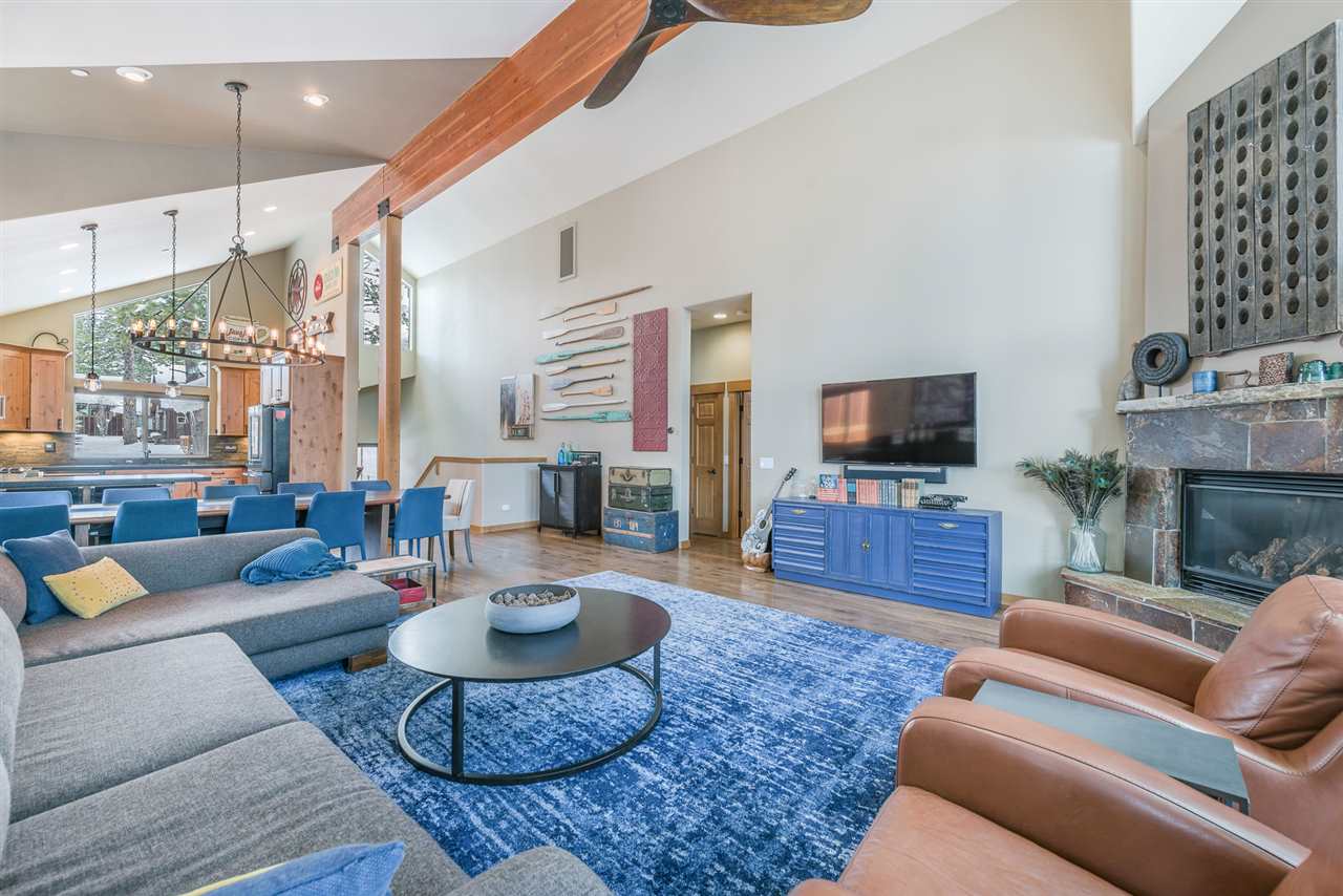 10427 Winter Creek Loop Truckee, CA 96161 - Photo 5 of 21 a living room with furniture and a flat screen tv