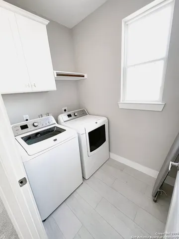 a view of a balcony with wooden floor