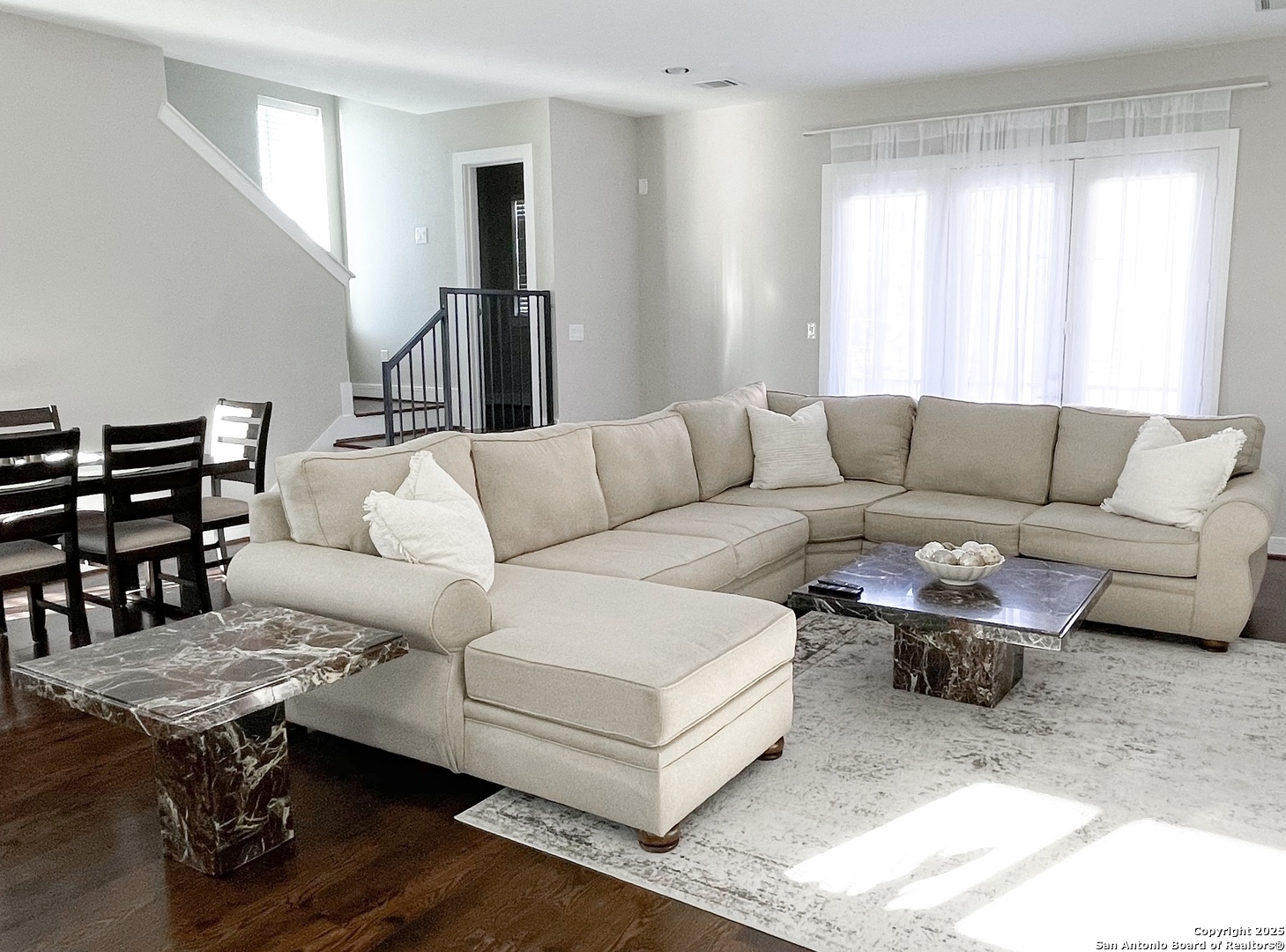 2502 Hadley Street Houston, TX 77003 - Photo 2 of 23 a living room with furniture a wooden floor and a window