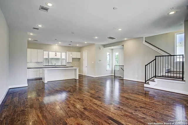 a view of kitchen with wooden floor