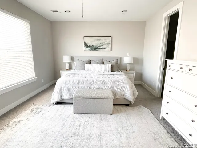 a white bath tub sitting in a bathroom