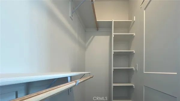 a view of wooden floor in an empty room