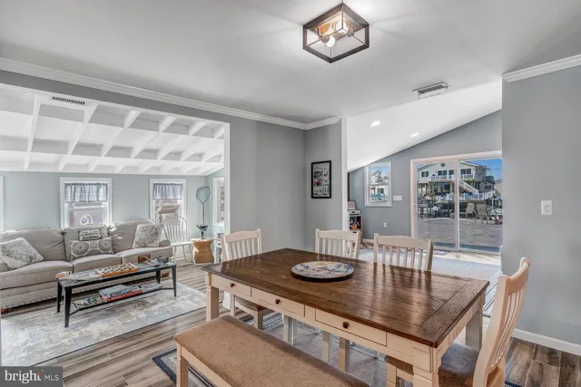 a kitchen with granite countertop a stove and a sink