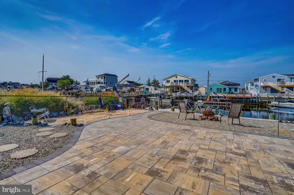 a view of a chairs and tables in patio