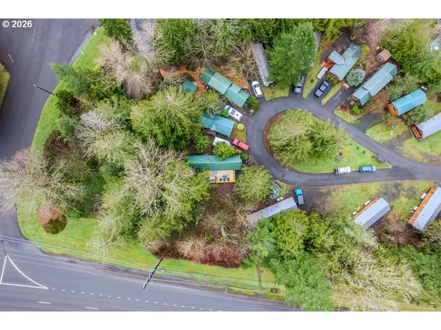 an aerial view of a house with a garden